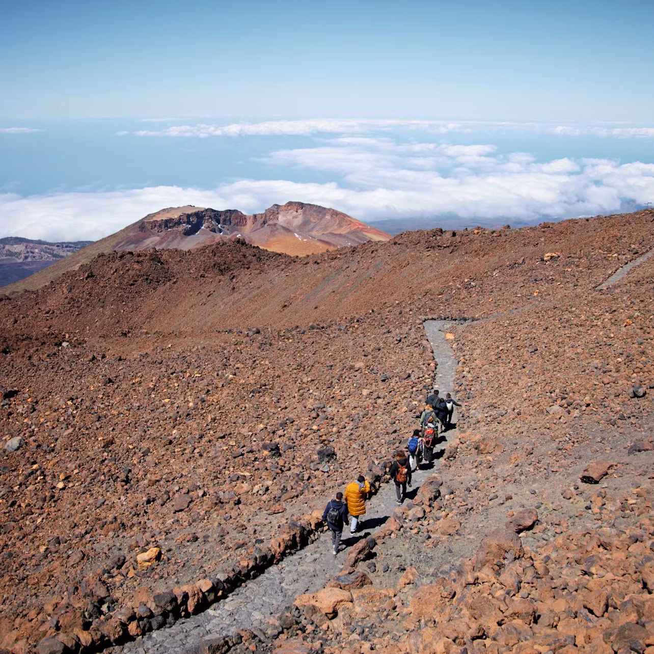 Group hiking to the summit