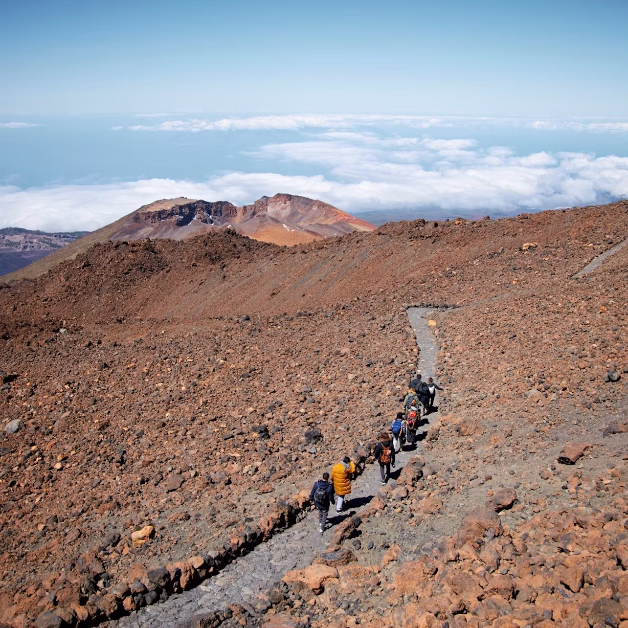 Group hiking to the summit