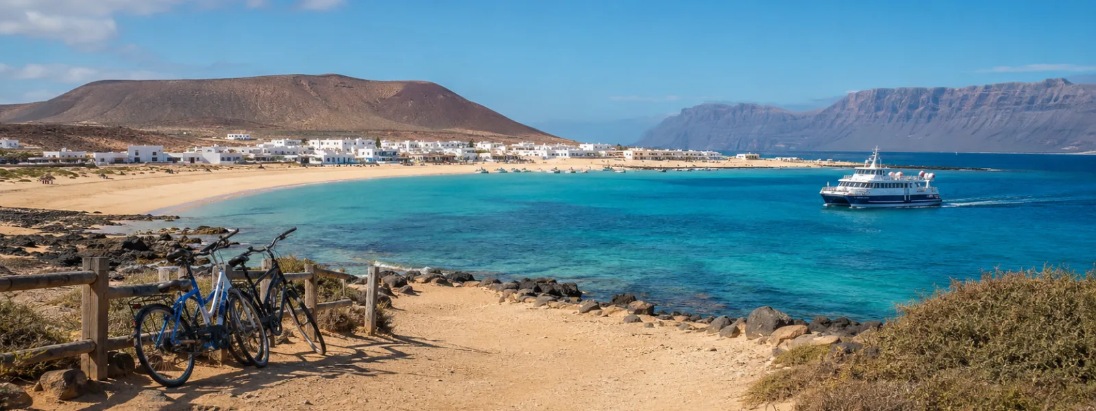 La Graciosa day trip from Lanzarote with ferry, sandy paths, turquoise water and Famara cliffs