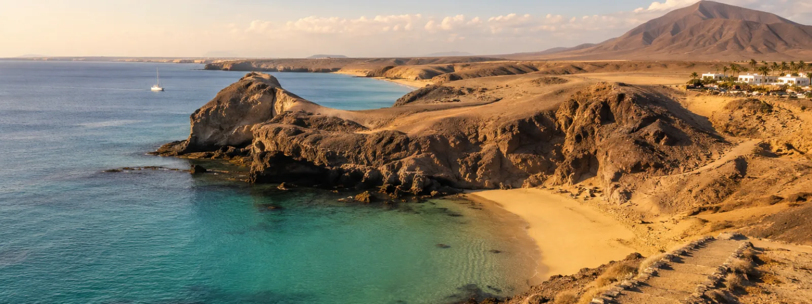 Papagayo beaches near Playa Blanca in Lanzarote with volcanic cliffs and turquoise coves