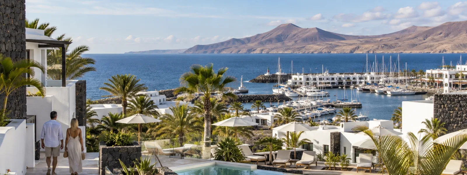 Whitewashed Lanzarote resort with volcanic-stone walls, a pool and Marina Rubicon overlooking the Atlantic