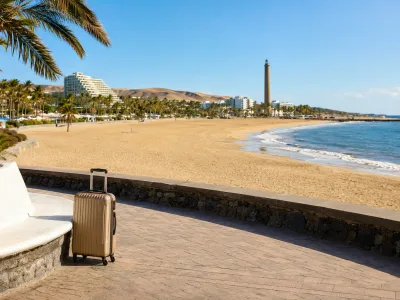 Sunny Playa del Ingles beach and Maspalomas dunes in Gran Canaria, a practical arrival base from Gran Canaria Airport