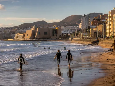 Surfers at La Cicer on Playa de Las Canteras in Las Palmas de Gran Canaria