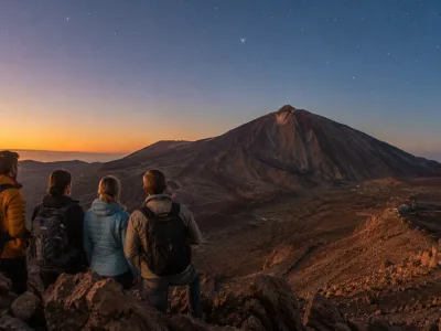 Travelers watching sunset and stars over Mount Teide in Tenerife