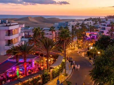Evening hotel and nightlife scene near Yumbo Centre in Playa del Ingles, Gran Canaria