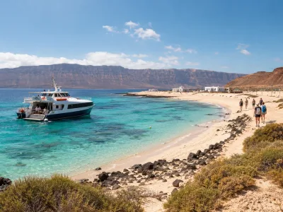 Turquoise water and volcanic coastline on La Graciosa day trip from Lanzarote