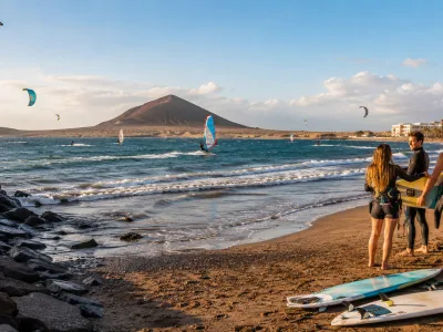 Windsurfers and surfers on the south Tenerife coast near El Medano and Playa de las Americas