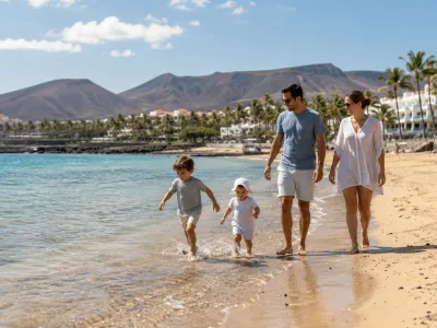 Family beach holiday scene in the Canary Islands for comparing Tenerife and Gran Canaria with young children