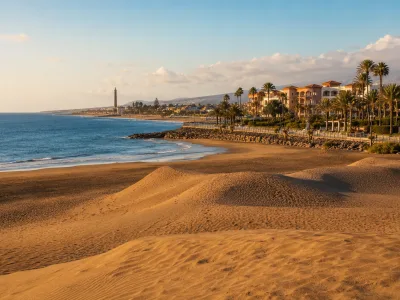 Panoramic view of dunes, ocean and a resort area in southern Gran Canaria