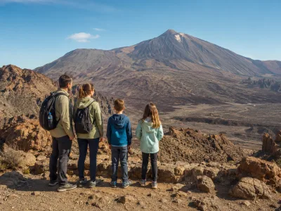 Family looking across the volcanic landscape of Mount Teide National Park in Tenerife
