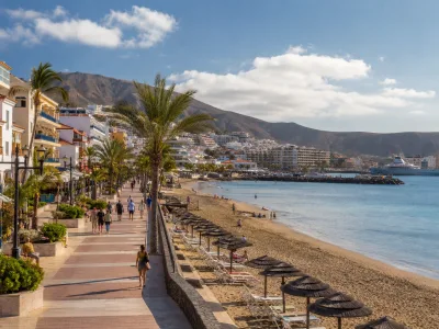 Sunny south Tenerife promenade and beach scenery for Los Cristianos and Costa Adeje holidays