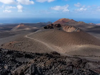 Volcanic landscape in Timanfaya National Park, Lanzarote, for a tour and rental car planning guide