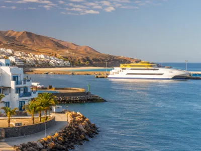 Morro Jable ferry port and coastal hotels in Fuerteventura for travellers crossing to Gran Canaria