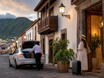 Historic La Laguna street in Tenerife with luggage and Anaga mountains, ideal for airport and Anaga travel planning