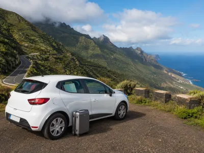 Compact rental car on a scenic north Tenerife mountain road for a Tenerife North Airport car hire guide