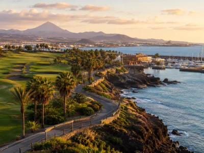 Golf del Sur and Amarilla Golf coastal resort area near Tenerife South Airport with fairways, marina and Atlantic views