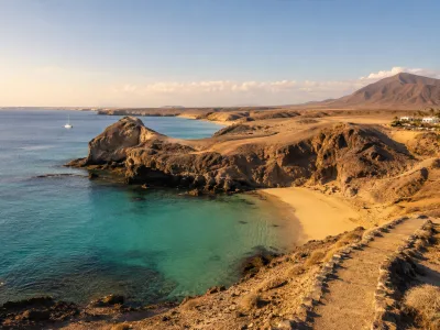 Papagayo beaches near Playa Blanca in Lanzarote with volcanic cliffs and turquoise coves