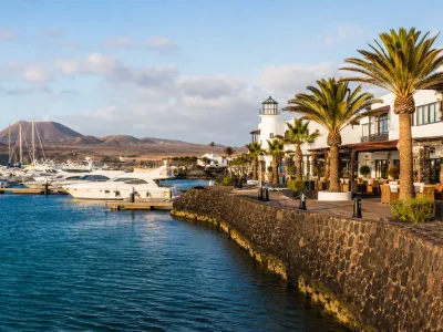 Marina Rubicon waterfront in Playa Blanca, Lanzarote with yachts and resort promenade