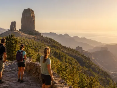 Travellers looking toward Roque Nublo in the mountains of Gran Canaria