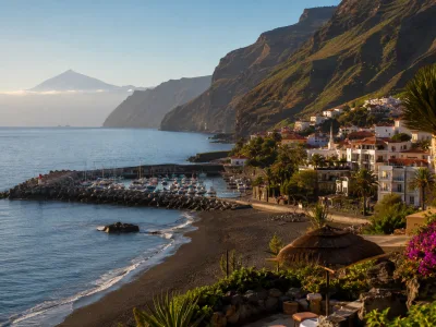 Playa de Santiago in La Gomera with volcanic beach, marina and south coast hotel scenery