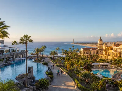 Luxury resorts and pools on the Meloneras coast of Gran Canaria near Maspalomas lighthouse
