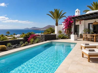 Whitewashed Canary Islands holiday villa with a private pool, volcanic-stone garden and Atlantic Ocean view