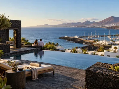 Adults-only Lanzarote hotel terrace overlooking the Atlantic Ocean and a Puerto Calero-style marina