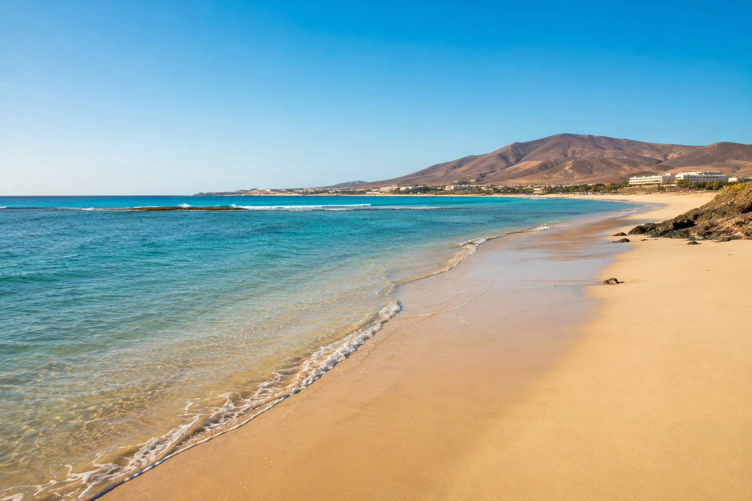 Wide sandy beach and turquoise lagoon on the Jandia peninsula in southern Fuerteventura