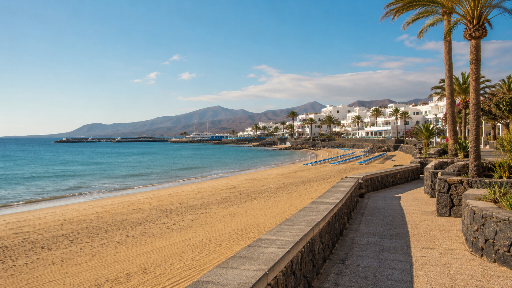 Puerto del Carmen beach and promenade in Lanzarote for a hotel area guide