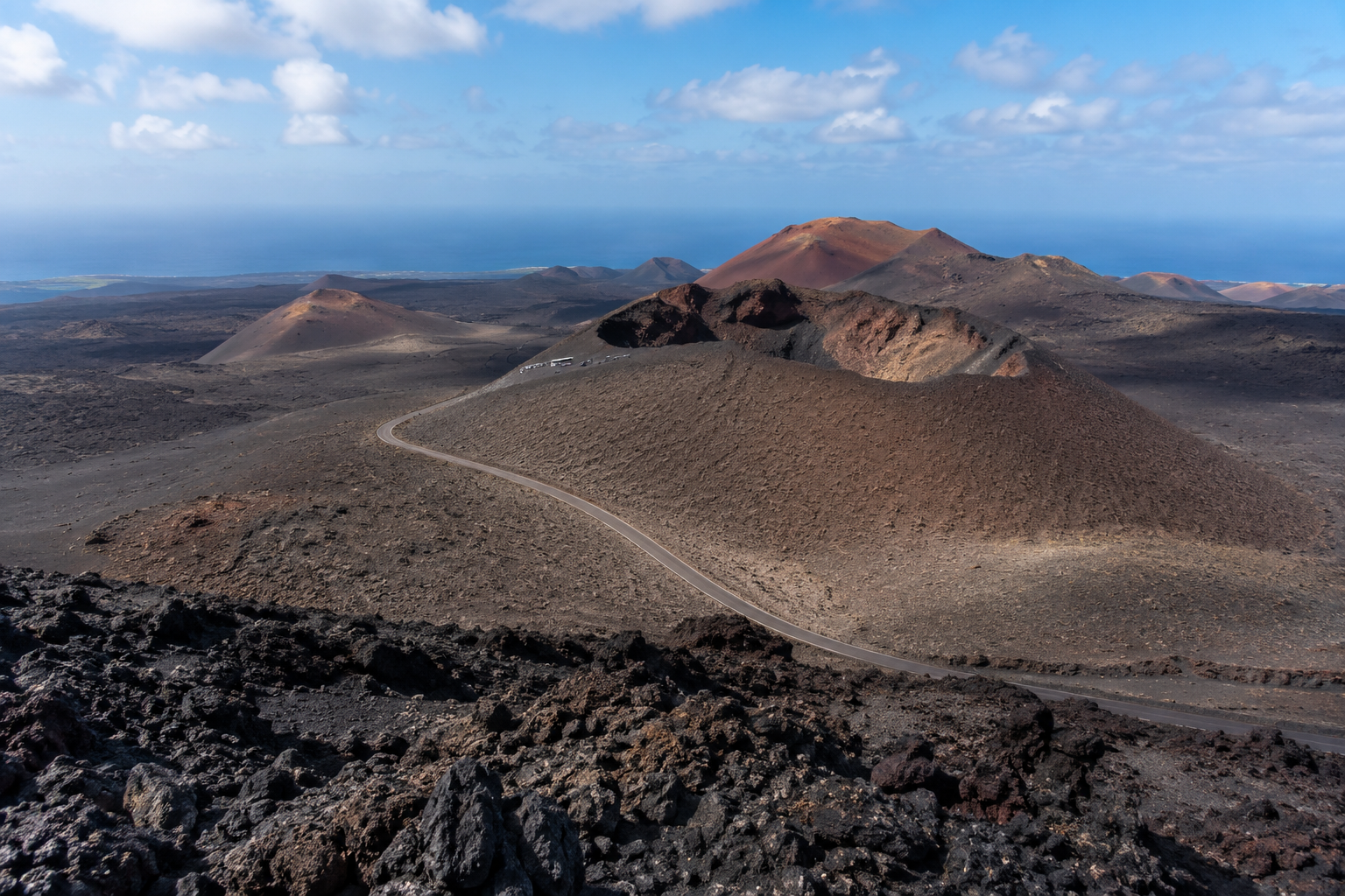 Volcanic landscape in Timanfaya National Park, Lanzarote, for a tour and rental car planning guide