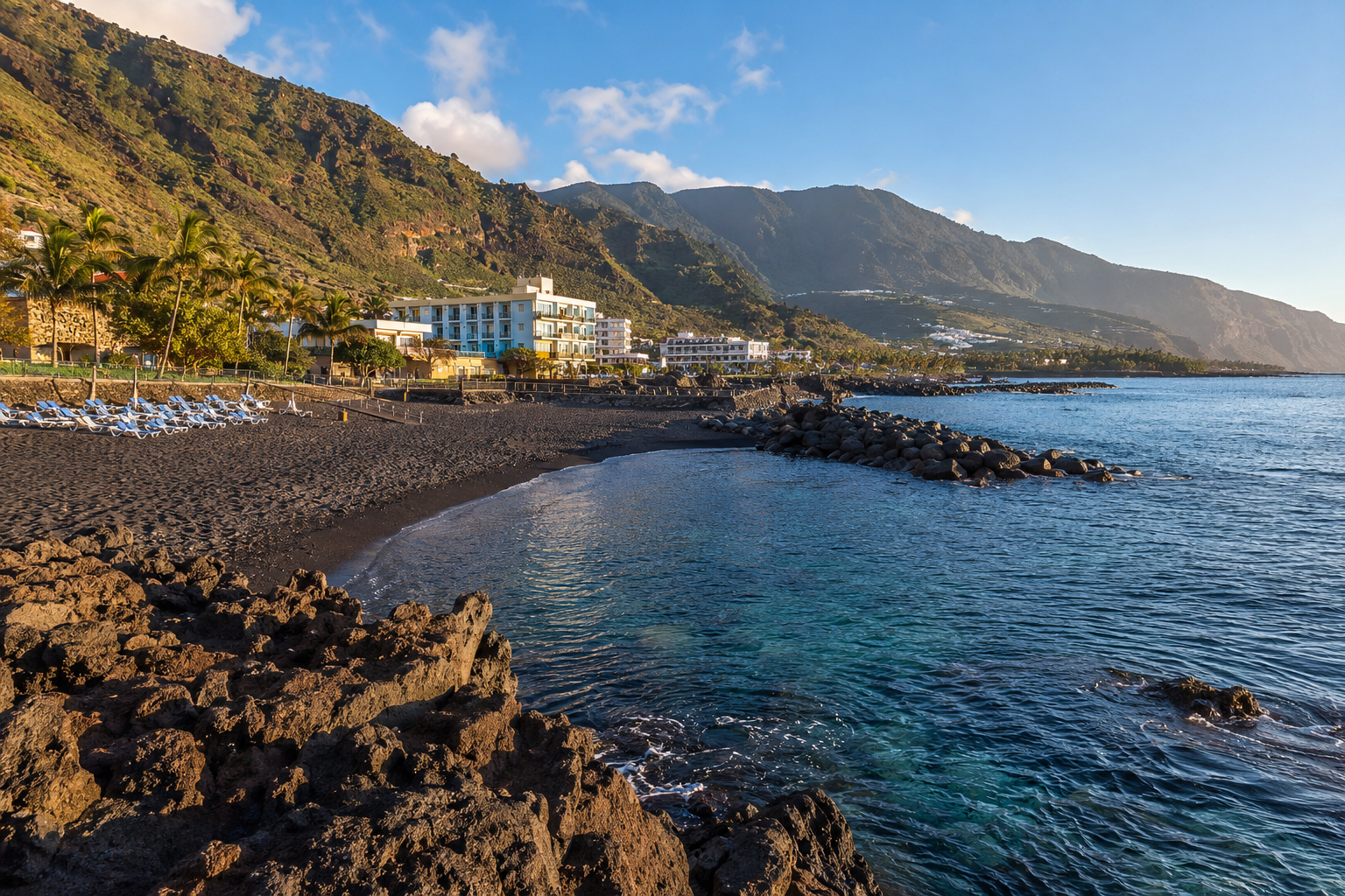 Los Cancajos black sand beach and volcanic breakwaters in La Palma